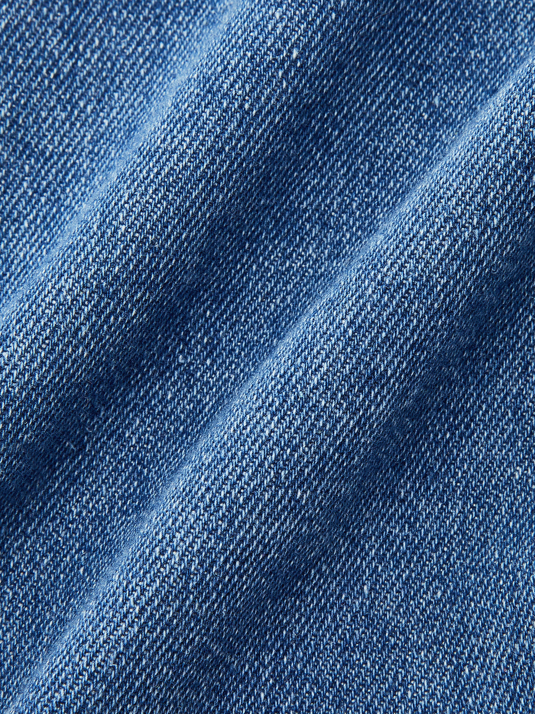 Taschenrock aus asymmetrischem Denim