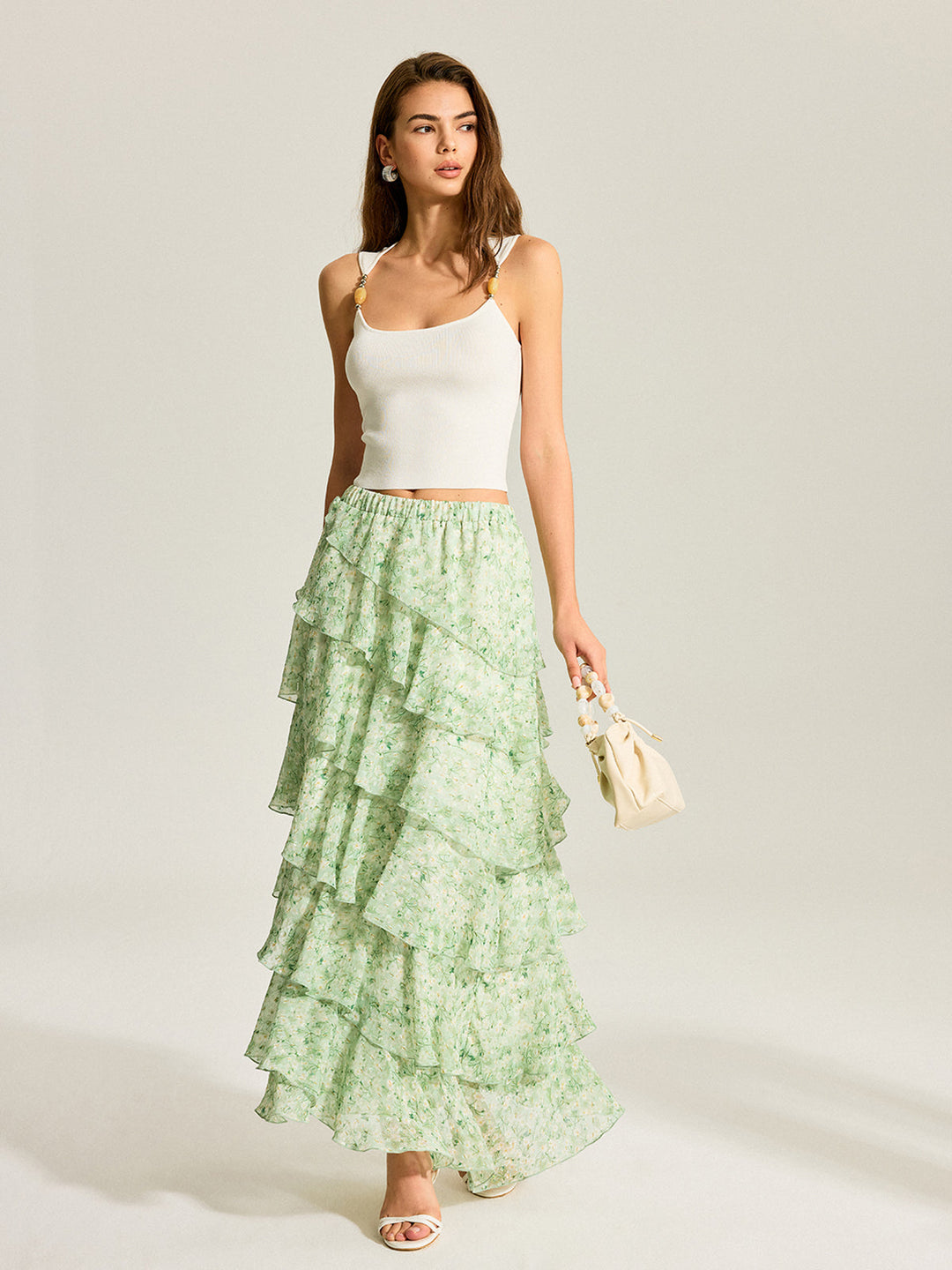 Halbtransparenter Chiffon-Rock mit goldenen Tupfen und Stufen