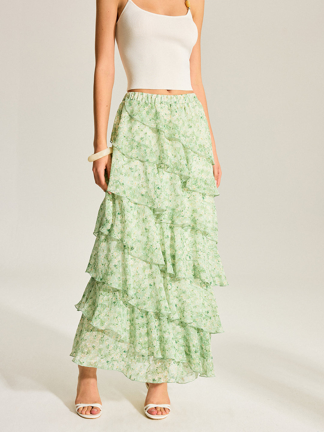 Halbtransparenter Chiffon-Rock mit goldenen Tupfen und Stufen
