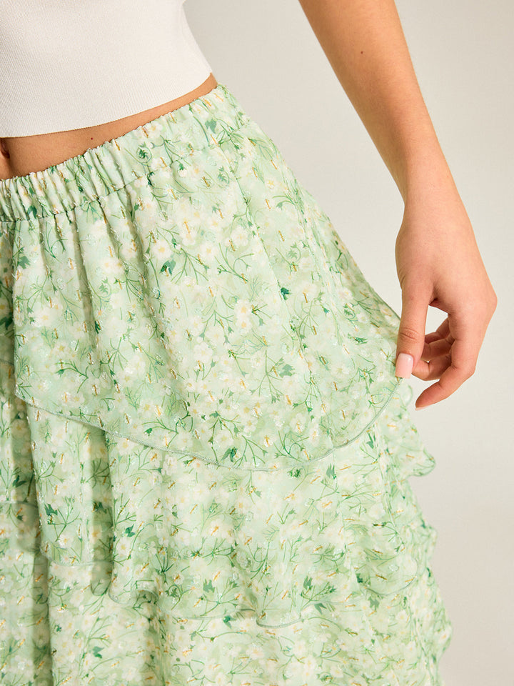 Halbtransparenter Chiffon-Rock mit goldenen Tupfen und Stufen