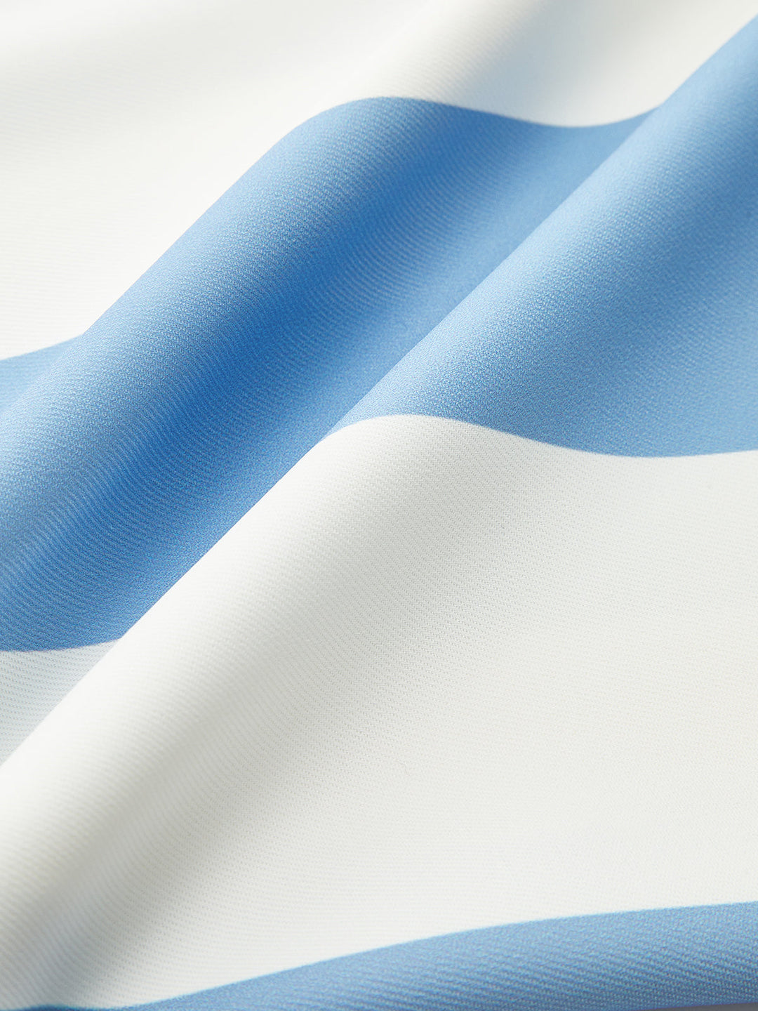 Gestreifte Hose mit Rüschenbesatz und Taschen