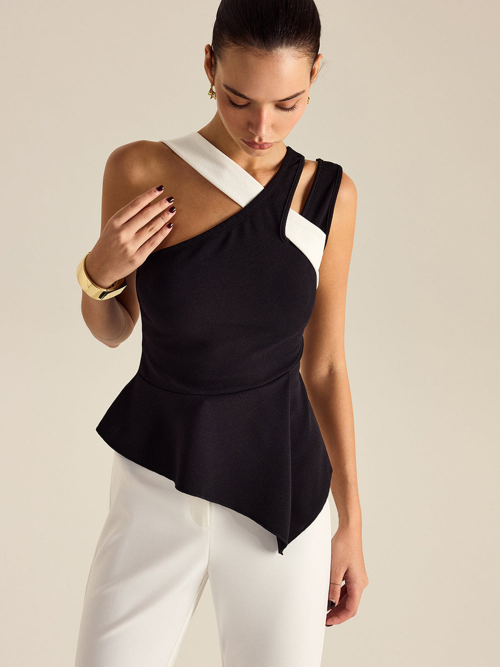 Asymmetrisches Peplum-Oberteil