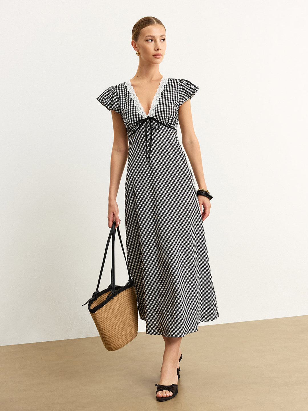 Gingham Kleid mit Rüschenärmeln und Spitzenbesatz