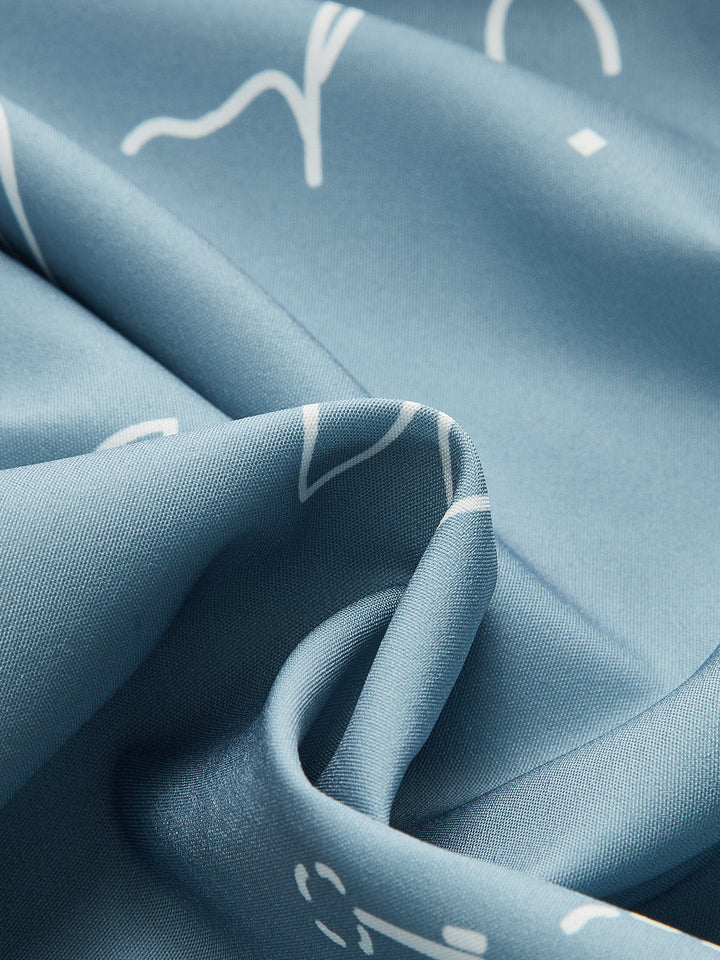 Bedrucktes Maxikleid mit Spaghettiträgern und Stufen