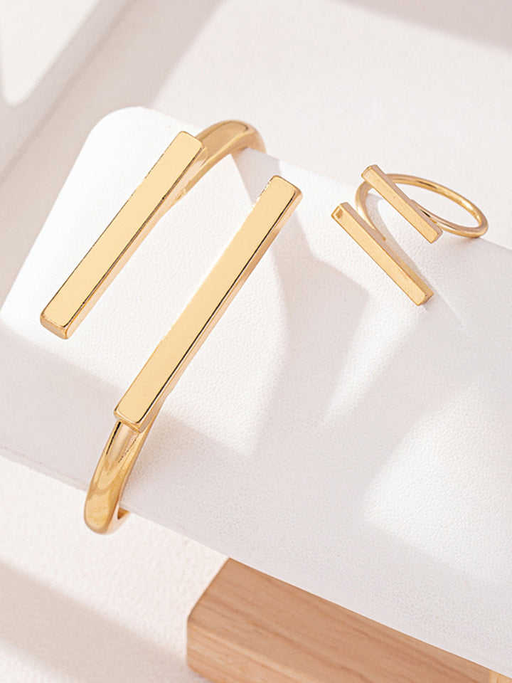 Geometrisches goldenes Ring- und Armband-Set