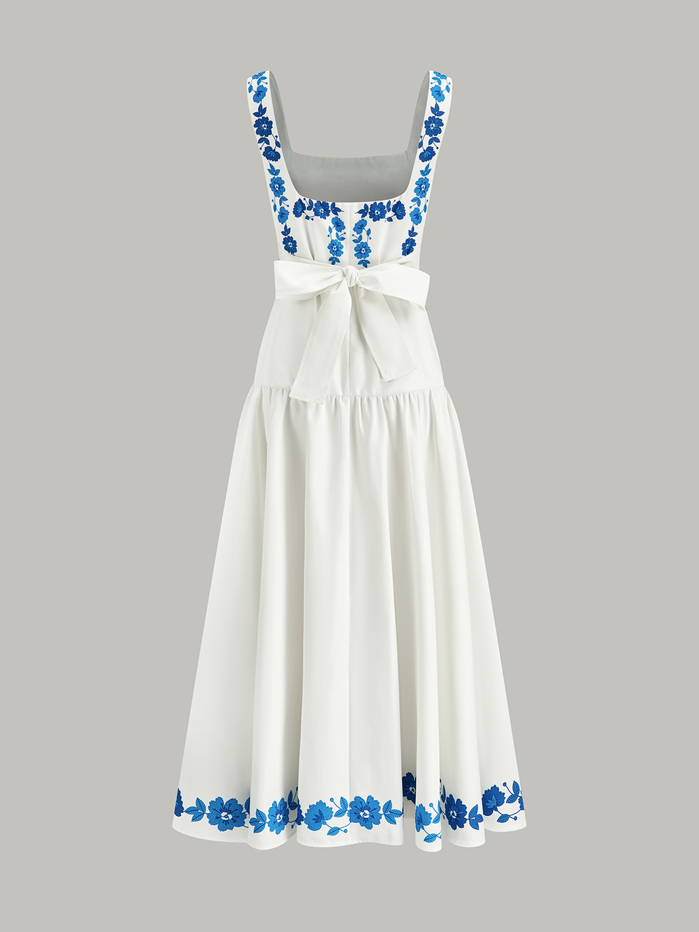Mittello-Kleid mit Schleifenrücken und Print
