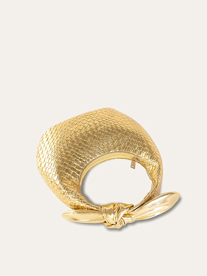 Goldene Tasche mit gewickeltem Knotenhenkel