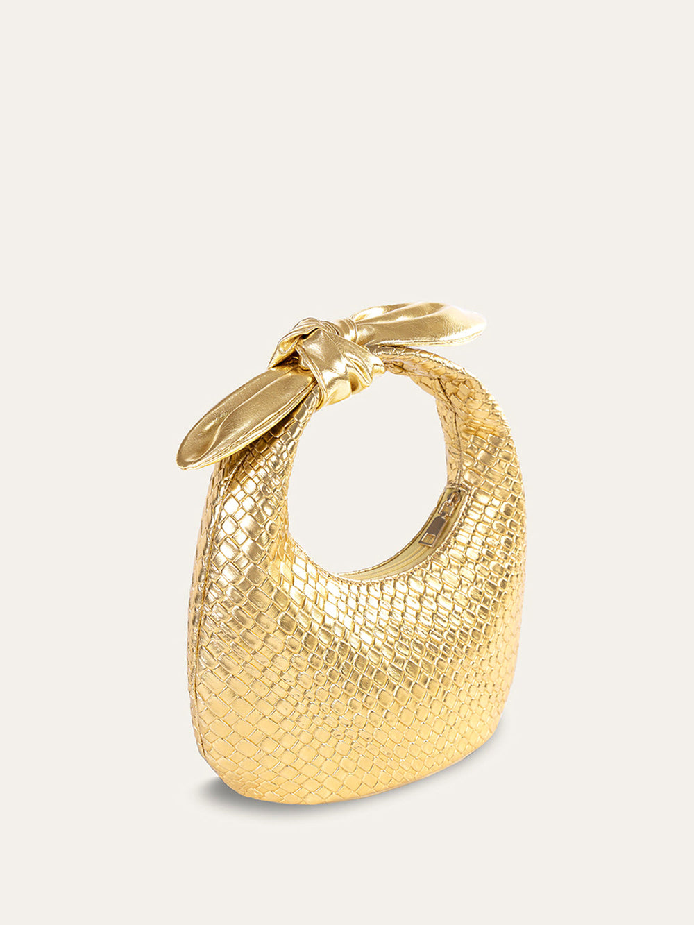 Goldene Tasche mit gewickeltem Knotenhenkel