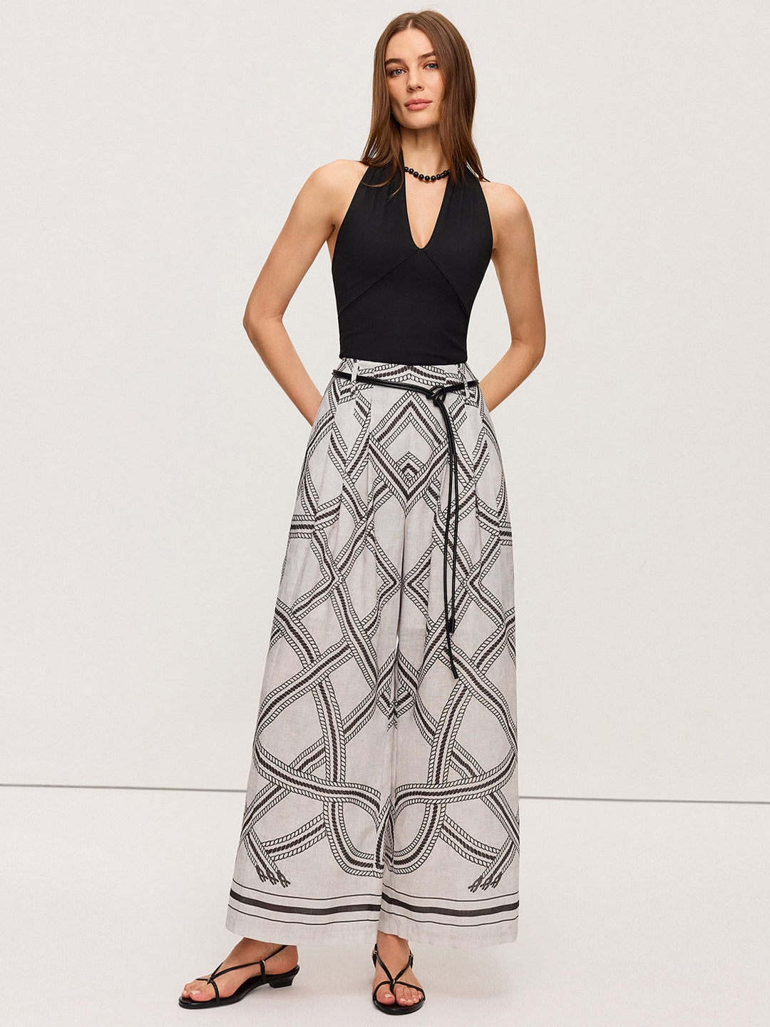 Hose mit geometrischem Print und weitem Bein mit Gürtel