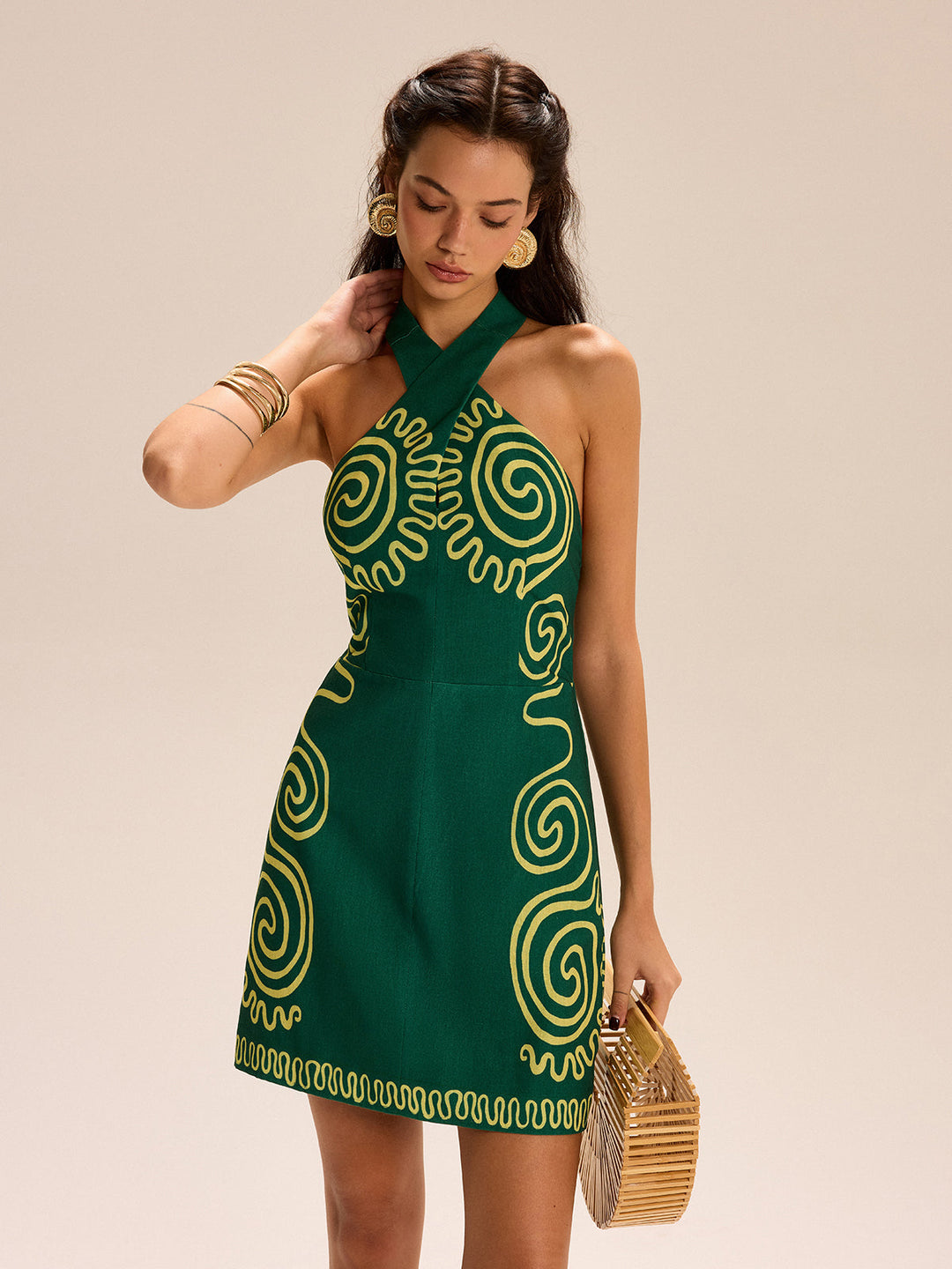 Kleid mit Neckholder und Wirbelmustern