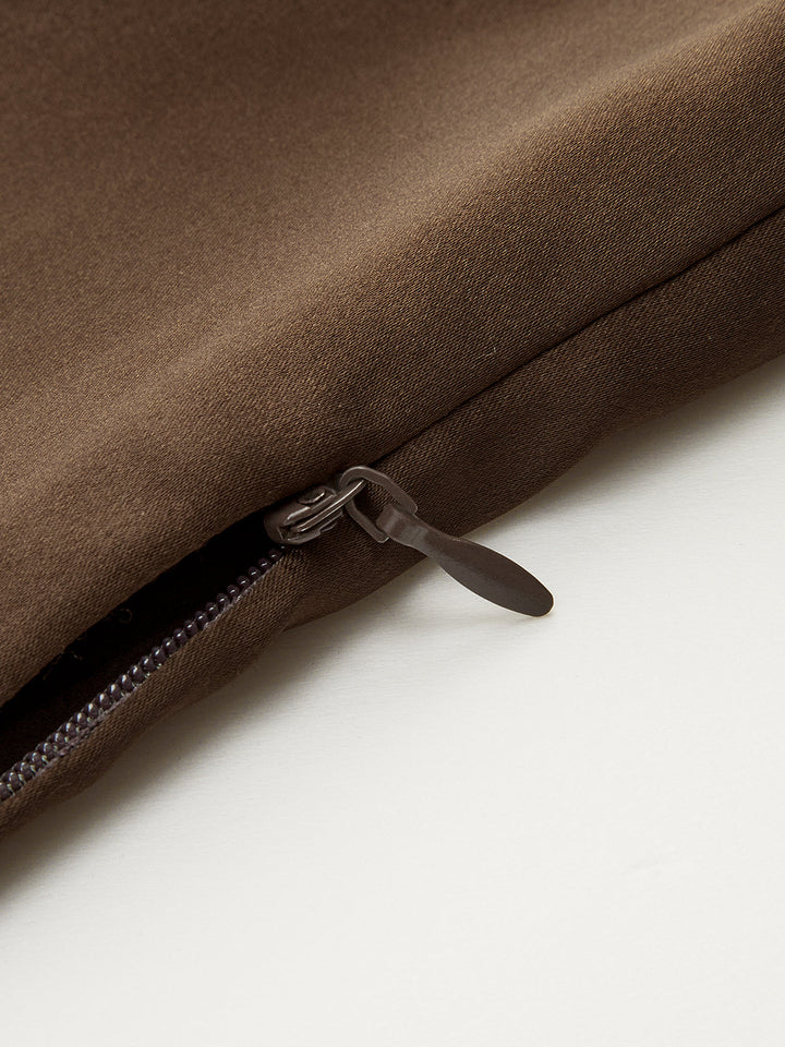 Asymmetrisches Neckholder-Oberteil mit großen Knöpfen