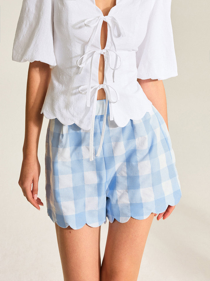Gingham-Shorts mit geschwungenem Saum