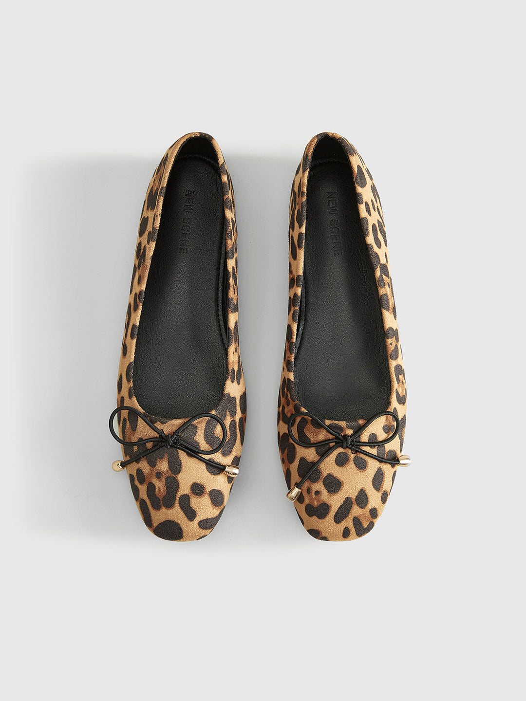 Ballerinas mit Schleifen-Detail und Leopardenmuster