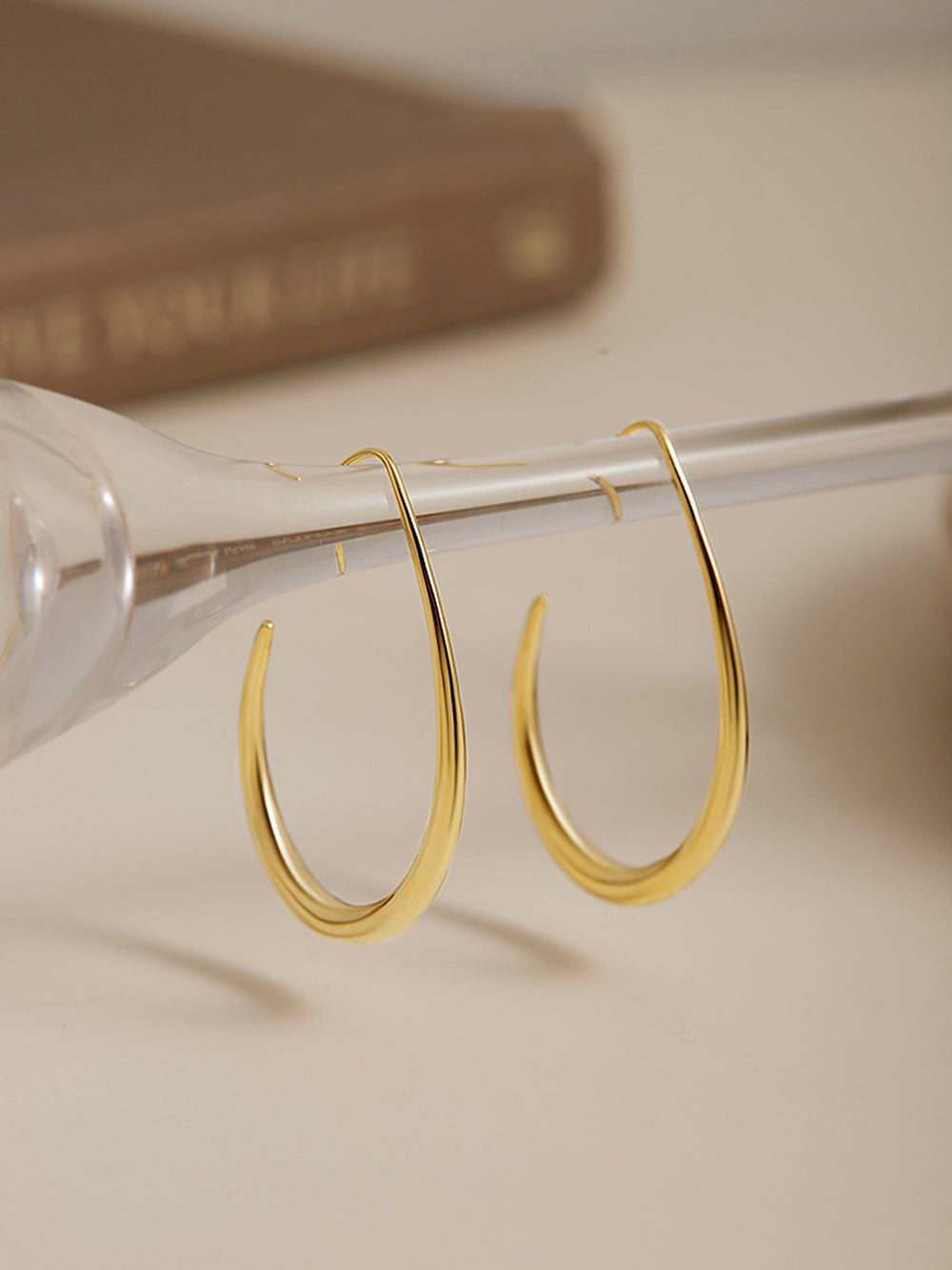 Goldene Fluid Creolen