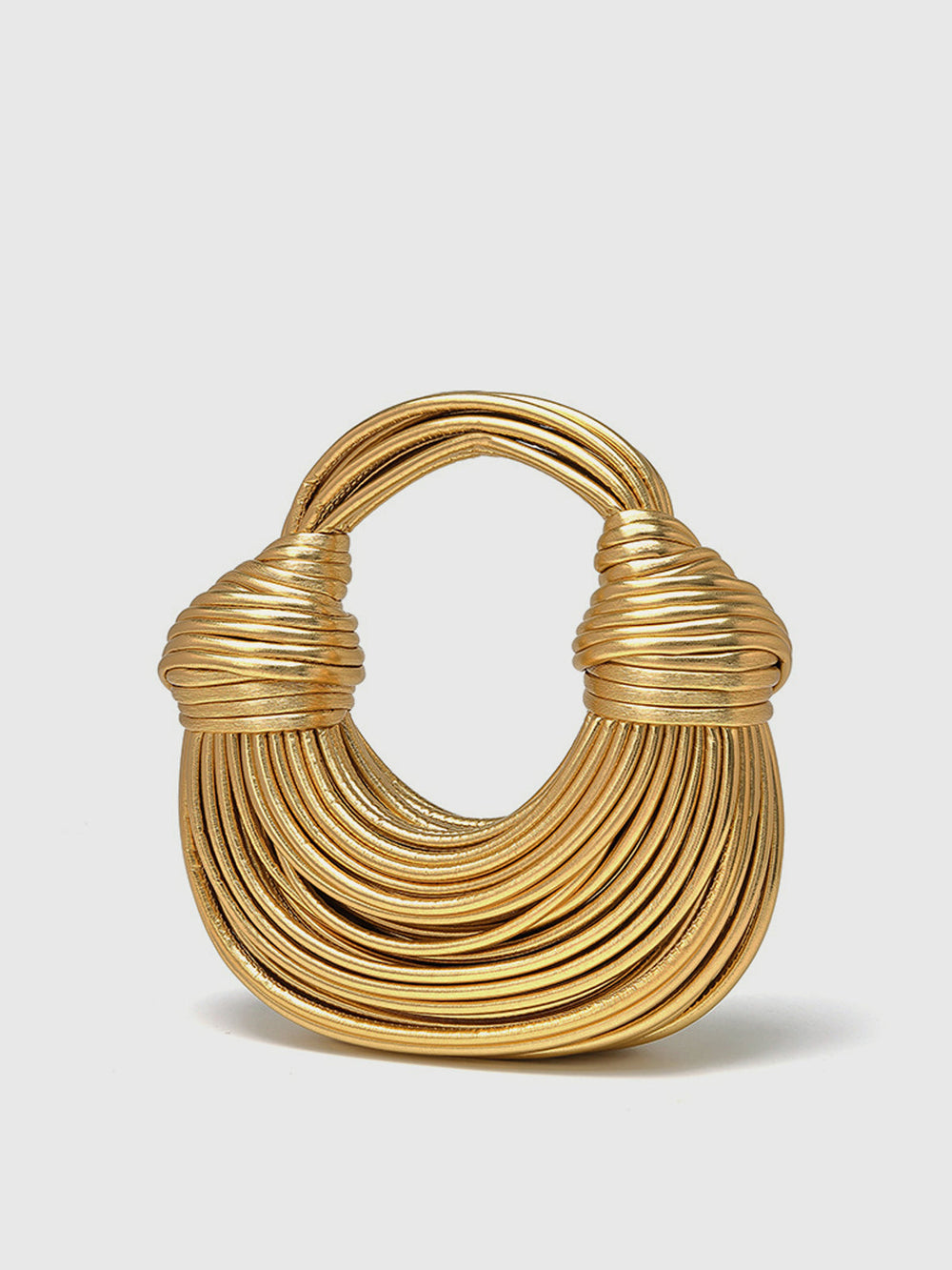 Goldene gedrehte Hoop-Tasche