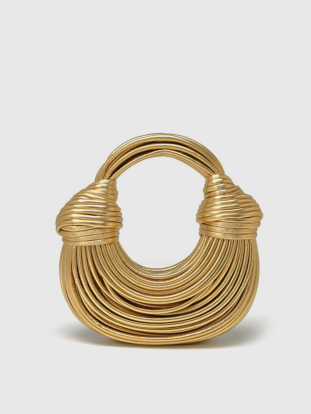 Goldene gedrehte Hoop-Tasche