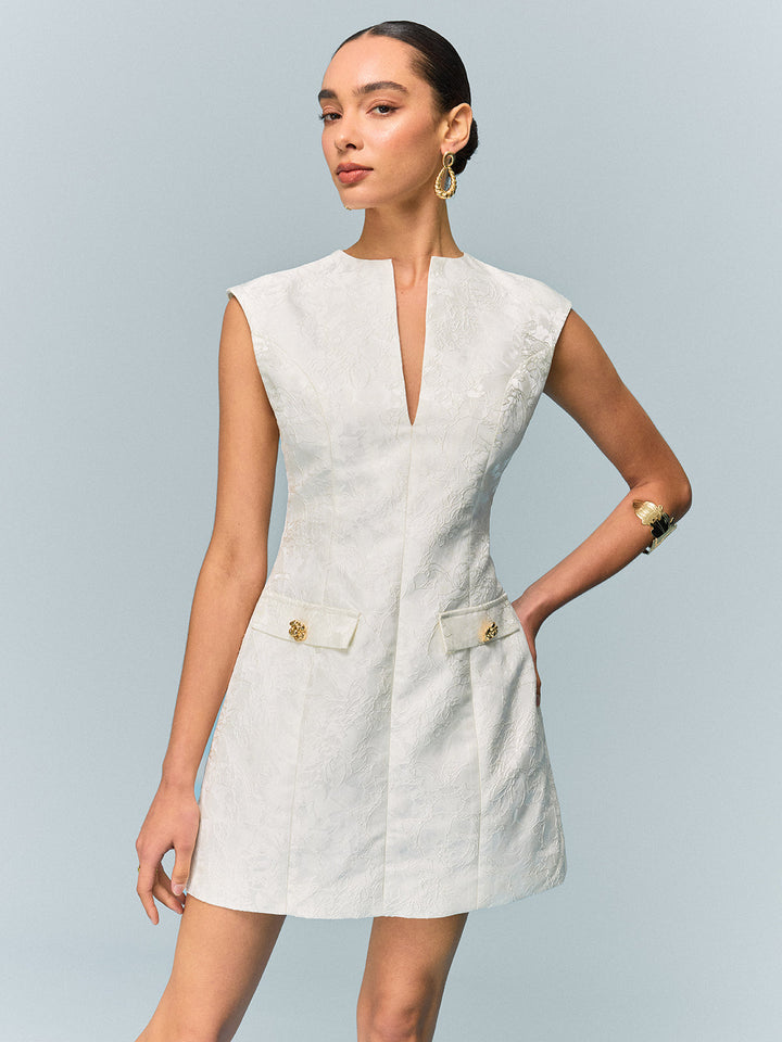 Pocketkleid mit Struktur und Metallknopf