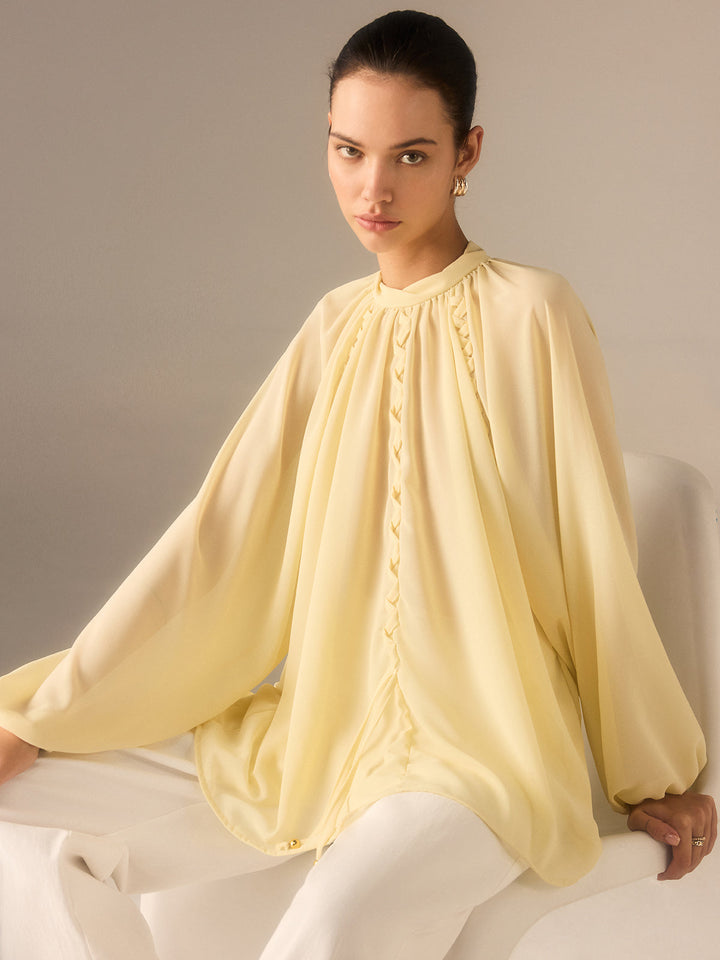 Halbtransparente Chiffon-Bluse mit Stehkragen und geflochtenen Details