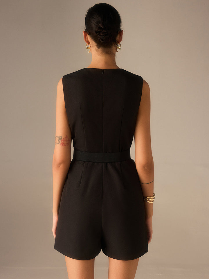 Jumpsuit mit Gürtel und Knöpfen aus Metall