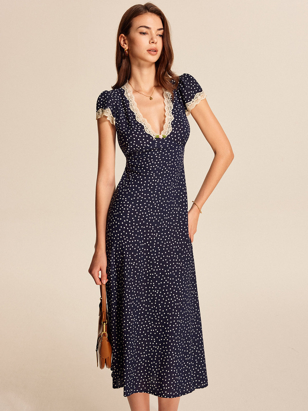 Kleid mit Polka-Dot-Spitzenbesatz