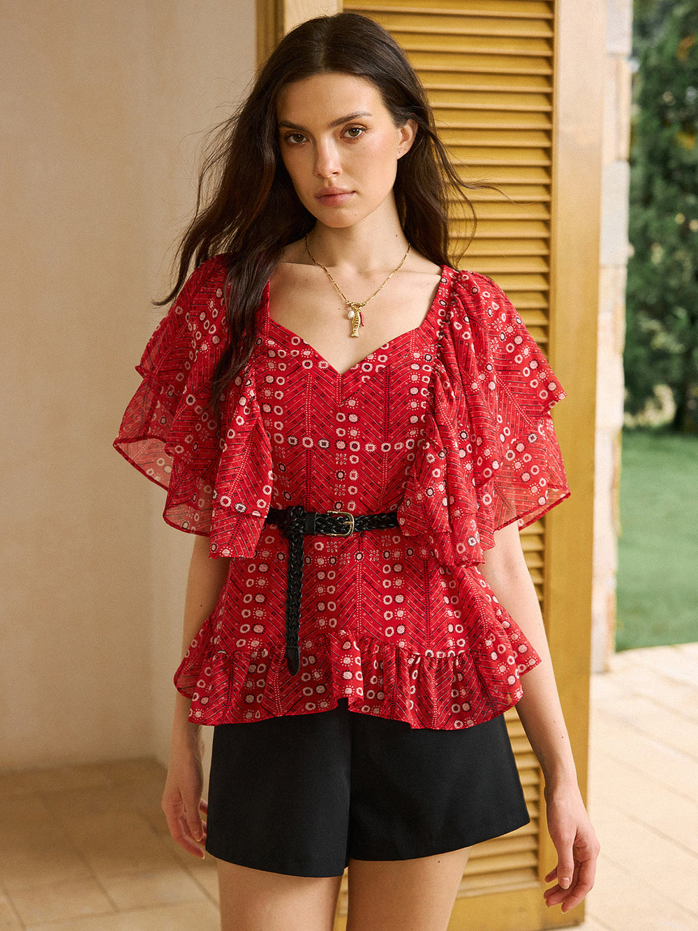 Bedrucktes Peplum-Oberteil mit Gürtel