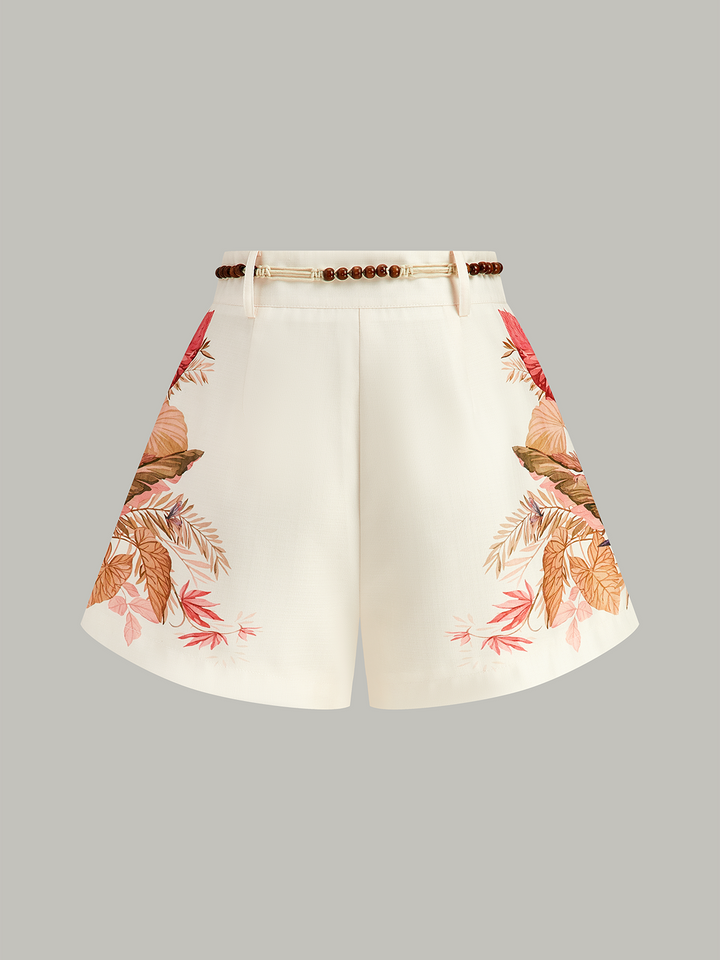 Kurze Hose mit tropischem Print und Gürtel in der Taille