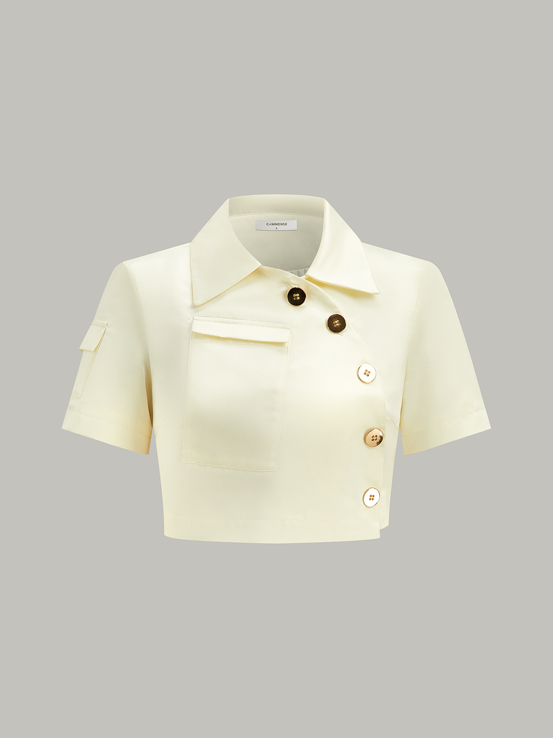 Asymmetrische Ballonbluse mit Knöpfen