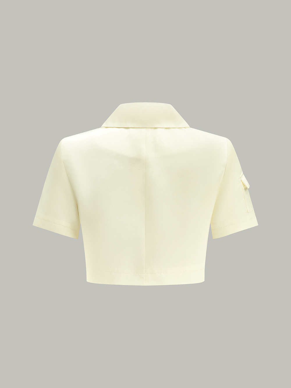Asymmetrische Ballonbluse mit Knöpfen