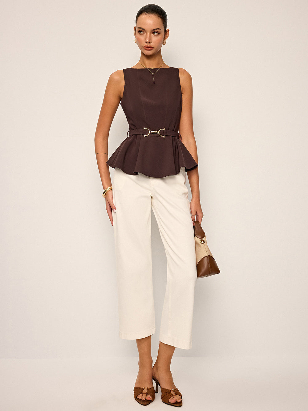 Ärmelloses Peplum-Oberteil mit Gürtel mit Metallschnalle