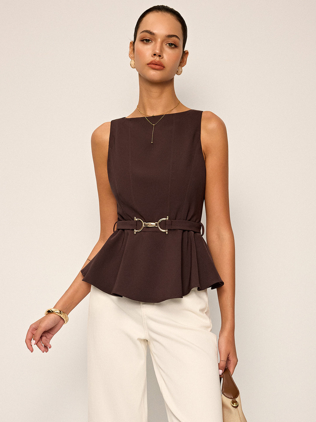 Ärmelloses Peplum-Oberteil mit Gürtel mit Metallschnalle