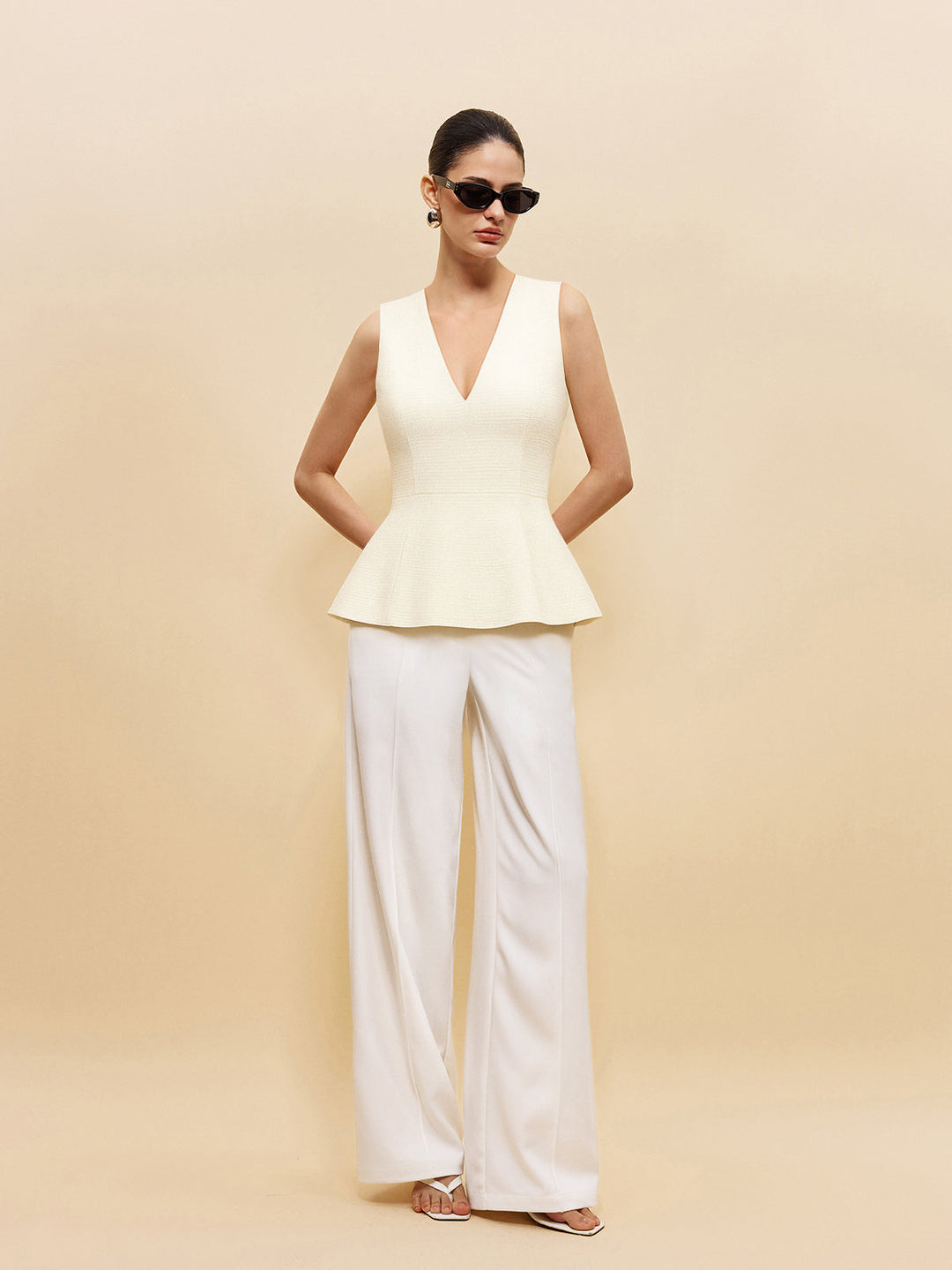 Gestreifte Langarm-Peplum-Bluse mit V-Ausschnitt