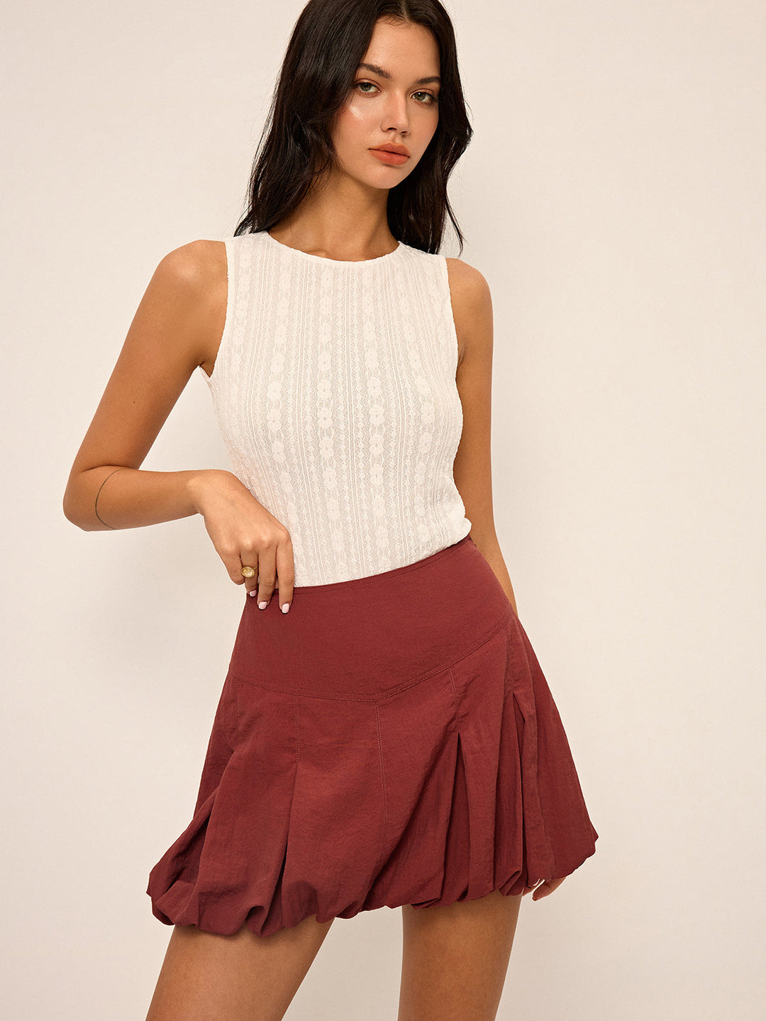 High-Waisted Faltenrock mit Ballonsaum
