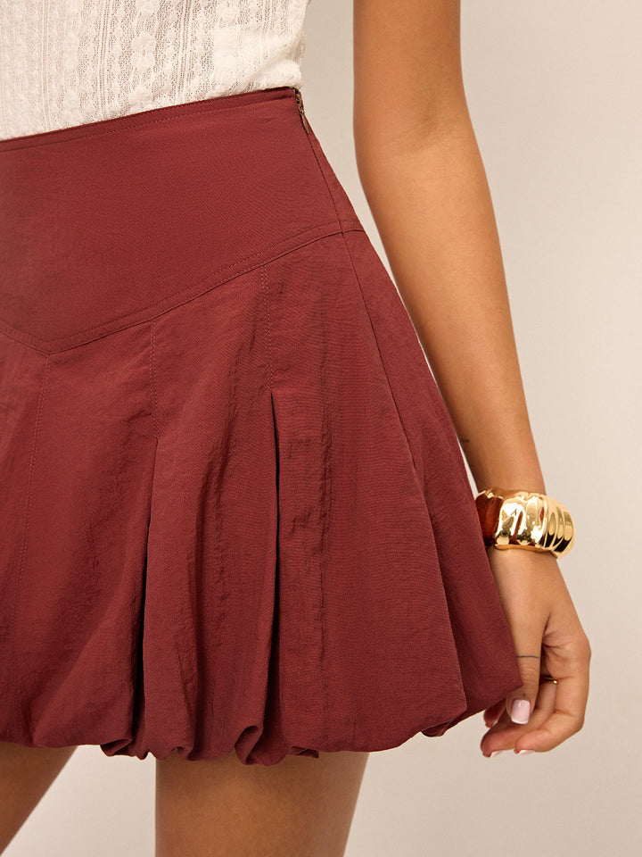 High-Waisted Faltenrock mit Ballonsaum