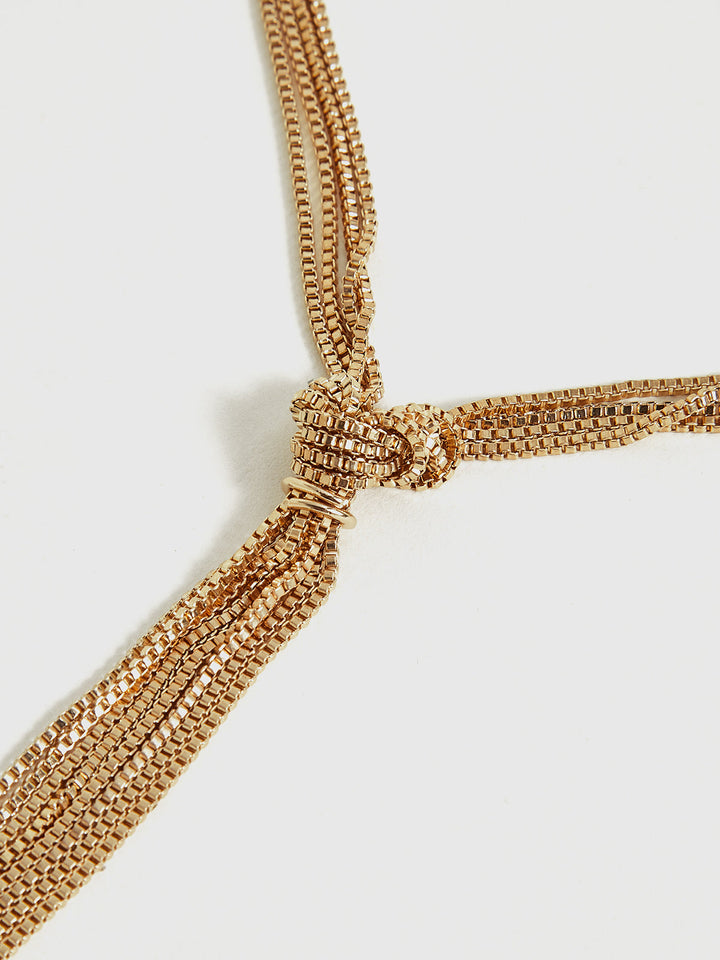 Goldene Y-förmige Halskette mit Knoten
